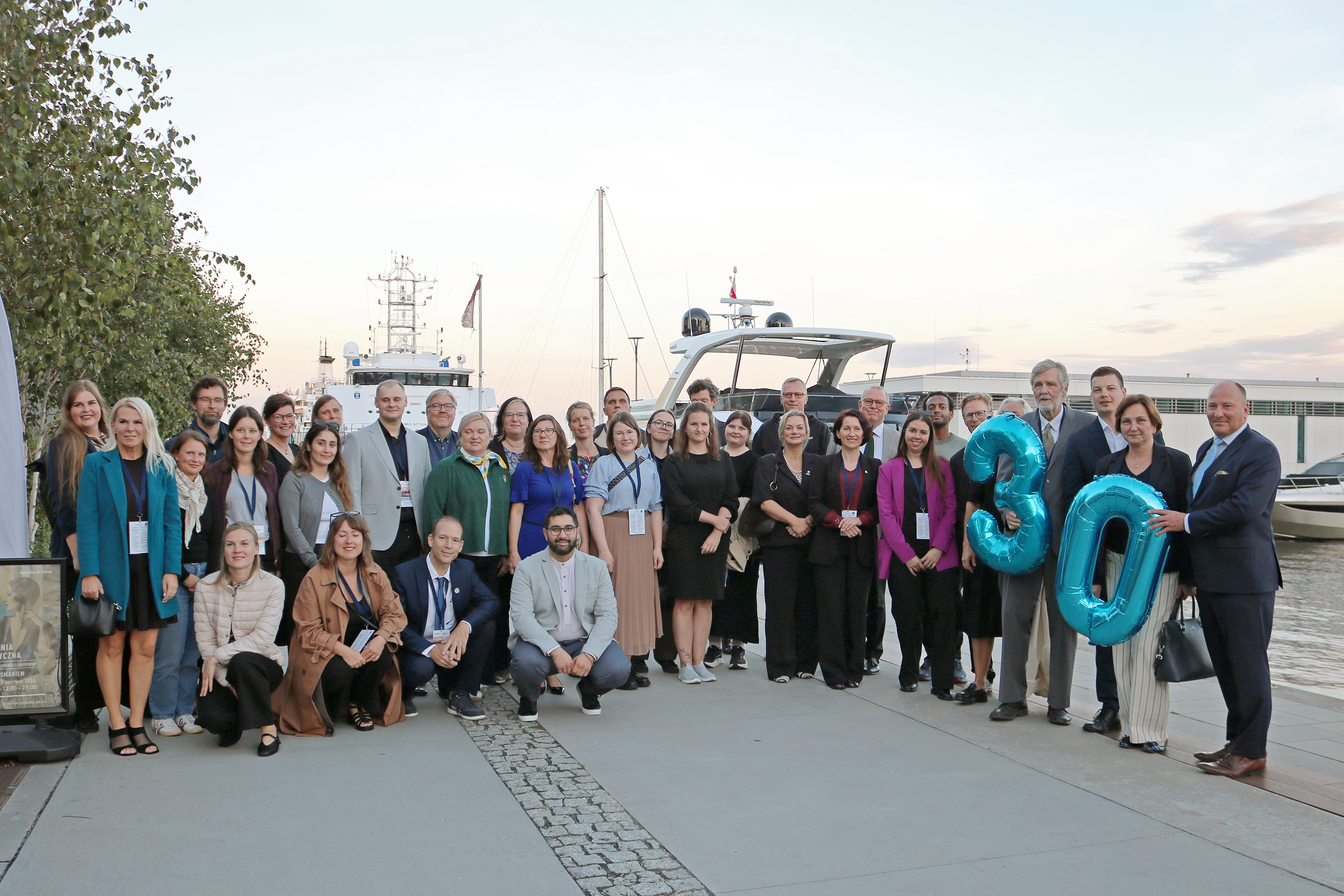 Group photo from celebrating 30 years of SCC Secretariat