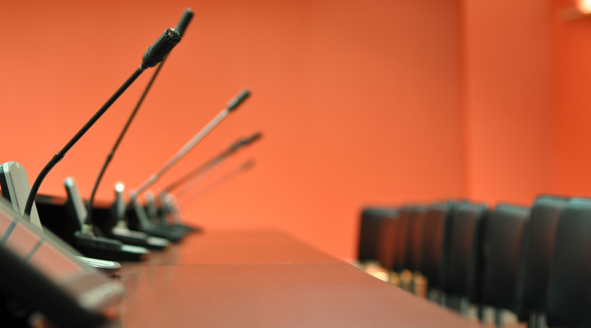 The line of microphones for speakers.
