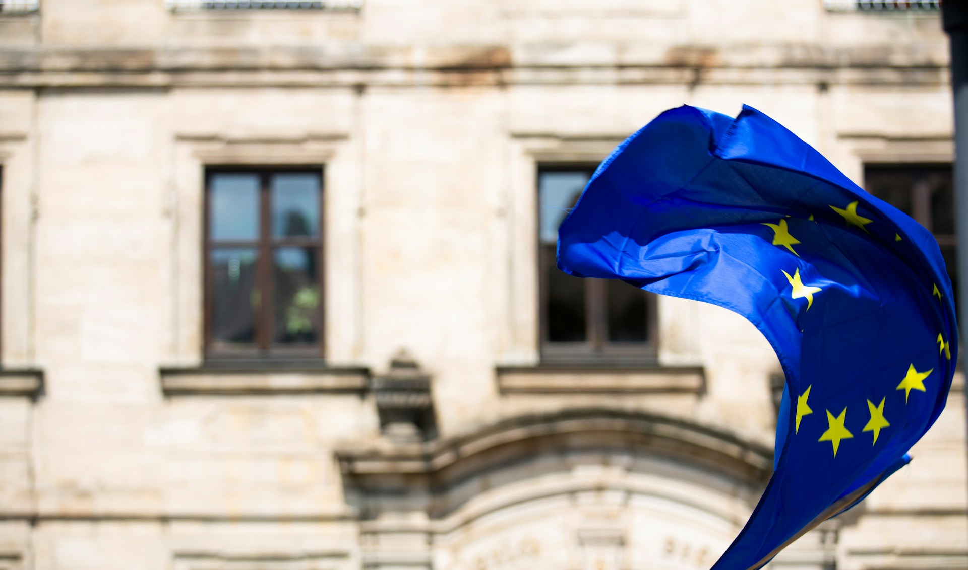 EU flag in front of a building